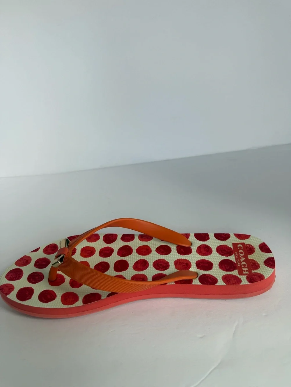 COACH Amel Coral Orange Polka Dot Flip Flops Sandals Gold Bow Women’s 7–8